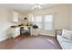 Cozy office space with built-in desk, storage cabinets, and lots of natural light at 8404 Imperial Cir # 8404, Palmetto, FL 34221
