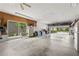 Spacious garage with ample storage, a utility sink, and a convenient side door leading to the exterior at 8630 51St E Ter, Bradenton, FL 34211