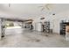 Large garage providing plenty of room for vehicles and storage, with easy access to the house and outdoors at 8630 51St E Ter, Bradenton, FL 34211