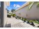 Spacious patio with lush greenery, brick pavers, providing a serene outdoor retreat at 8630 51St E Ter, Bradenton, FL 34211