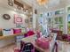 Bright and organized home office with custom built-ins and ample storage at 8687 Woodbriar Dr, Sarasota, FL 34238
