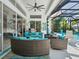The screened-in pool area offers ample seating and outdoor cooking space, great for entertainment at 8687 Woodbriar Dr, Sarasota, FL 34238