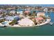 A waterfront building lot featuring panoramic water views in a serene neighborhood with quick access to the open bay at 894 Freeling Dr, Sarasota, FL 34242