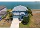 Gorgeous aerial view of this two story home with lake view and great landscaping at 9307 Raes Creek Pl, Palmetto, FL 34221