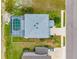 Aerial view of backyard featuring private screened in pool at 9307 Raes Creek Pl, Palmetto, FL 34221