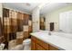 Bathroom featuring vanity and shower with decorative patterned shower curtain at 9307 Raes Creek Pl, Palmetto, FL 34221