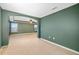 Spacious bedroom featuring neutral walls and carpeted flooring at 9307 Raes Creek Pl, Palmetto, FL 34221