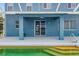 Home exterior featuring a covered patio and in-ground pool at 9307 Raes Creek Pl, Palmetto, FL 34221