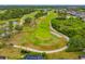 Aerial view of community golf course at 9307 Raes Creek Pl, Palmetto, FL 34221