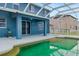 Covered patio and pool area of home at 9307 Raes Creek Pl, Palmetto, FL 34221