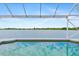 Backyard pool with lake view at 9307 Raes Creek Pl, Palmetto, FL 34221