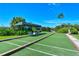Well-maintained bocce ball court with shaded seating area at 9320 Clubside Cir # 2208, Sarasota, FL 34238