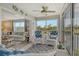Inviting lanai featuring comfortable seating with views of surrounding landscapes and interiors at 9320 Clubside Cir # 2208, Sarasota, FL 34238