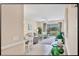 Spacious living room with neutral tones and beautiful views of the outdoors at 9641 Castle Point Dr # 1215, Sarasota, FL 34238