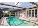 Relaxing screened pool area with crystal-clear water, ideal for outdoor entertainment and enjoying the Florida sunshine at 1108 65Th W Ave, Bradenton, FL 34207
