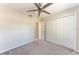 Bedroom features include carpet, closet, ceiling fan and standard window at 1323 Arredondo St, North Port, FL 34286
