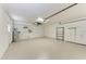 Spacious garage interior with storage space and utility connections at 1323 Arredondo St, North Port, FL 34286