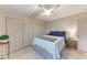 Comfortable bedroom with ceiling fan and double closet at 1520 Lakeside Way # 147, Sarasota, FL 34232