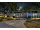 Charming home with a covered entrance, well-manicured lawn, and beautiful landscaping at 1520 Lakeside Way # 147, Sarasota, FL 34232