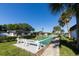 Well-maintained shuffleboard court with benches in a landscaped community area at 1520 Lakeside Way # 147, Sarasota, FL 34232