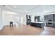 Spacious kitchen with a large island, stainless steel appliances, and sleek dark backsplash at 15722 San Lazzaro Ave, Lakewood Ranch, FL 34211