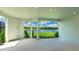 Covered patio featuring views of a lake and golf course at 15722 San Lazzaro Ave, Lakewood Ranch, FL 34211