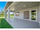 Back porch with ample space, offering an ideal indoor-outdoor flow at 16206 Arcaro Ave, Port Charlotte, FL 33954