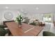 Spacious dining area connected to kitchen and living room, perfect for entertaining at 16206 Arcaro Ave, Port Charlotte, FL 33954