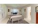 Cozy bedroom with a comfortable bed, stylish decor, and ample natural light at 1622 Stafford Ln # 1205, Sarasota, FL 34232