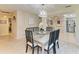Cozy dining room featuring a marble table and modern decor at 1622 Stafford Ln # 1205, Sarasota, FL 34232
