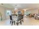 Cozy dining room featuring a marble table and modern decor at 1622 Stafford Ln # 1205, Sarasota, FL 34232