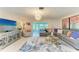 Spacious living area with modern furnishings and decor, filled with natural light at 1622 Stafford Ln # 1205, Sarasota, FL 34232