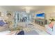 Spacious living area with a dining room view, stylish furnishings, and an open layout ideal for entertaining at 1622 Stafford Ln # 1205, Sarasota, FL 34232