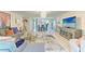 Inviting living room featuring a dining area view, comfortable seating, and a modern open-concept design at 1622 Stafford Ln # 1205, Sarasota, FL 34232