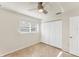 Bedroom with tile flooring, window and a closet at 2151 Upton Ave, Sarasota, FL 34232