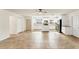 Spacious kitchen featuring white cabinets, stainless steel appliances, and ample countertop space at 2151 Upton Ave, Sarasota, FL 34232