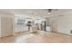 Well-lit kitchen boasting stainless steel appliances, white cabinets, and a convenient center island at 2151 Upton Ave, Sarasota, FL 34232