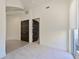 This bedroom is bright and spacious with neutral tones, two closets, and carpet for a luxurious feel at 221 Cosmopolitan Ct, Sarasota, FL 34236