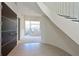 Bright entryway with tile flooring, modern door, and large window overlooking private outdoor space at 221 Cosmopolitan Ct, Sarasota, FL 34236