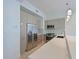 Sleek kitchen featuring stainless steel appliances, modern cabinetry, and a mosaic tile backsplash at 221 Cosmopolitan Ct, Sarasota, FL 34236