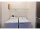 Laundry room featuring a washer and dryer at 221 Cosmopolitan Ct, Sarasota, FL 34236