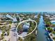 Beautiful waterfront home with lush landscaping and canal access, offering stunning views at 234 85Th St, Holmes Beach, FL 34217