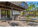 Relaxing back deck with chairs, a bar, and sunny views at 234 85Th St, Holmes Beach, FL 34217
