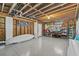 Basement with wooden wall, shelving and gray epoxy floor at 234 85Th St, Holmes Beach, FL 34217