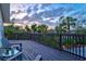 Outdoor deck featuring scenic views and lounge seating, perfect for enjoying sunset skies at 234 85Th St, Holmes Beach, FL 34217