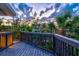 An exterior deck showcases scenic views and a tranquil setting, perfect for relaxing outdoors at 234 85Th St, Holmes Beach, FL 34217