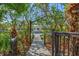 Private dock leading to waterfront and view of nearby home at 234 85Th St, Holmes Beach, FL 34217