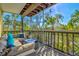 Beautiful screened-in porch with comfortable seating and scenic outdoor views at 234 85Th St, Holmes Beach, FL 34217