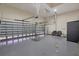 Spacious garage with ample room for vehicles, storage, and seating for added functionality at 24017 Peppercorn Rd, Punta Gorda, FL 33955