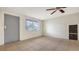 Bright, airy living room with large windows and tile floors offers a comfortable and versatile living space at 275 Burke Rd, Venice, FL 34293